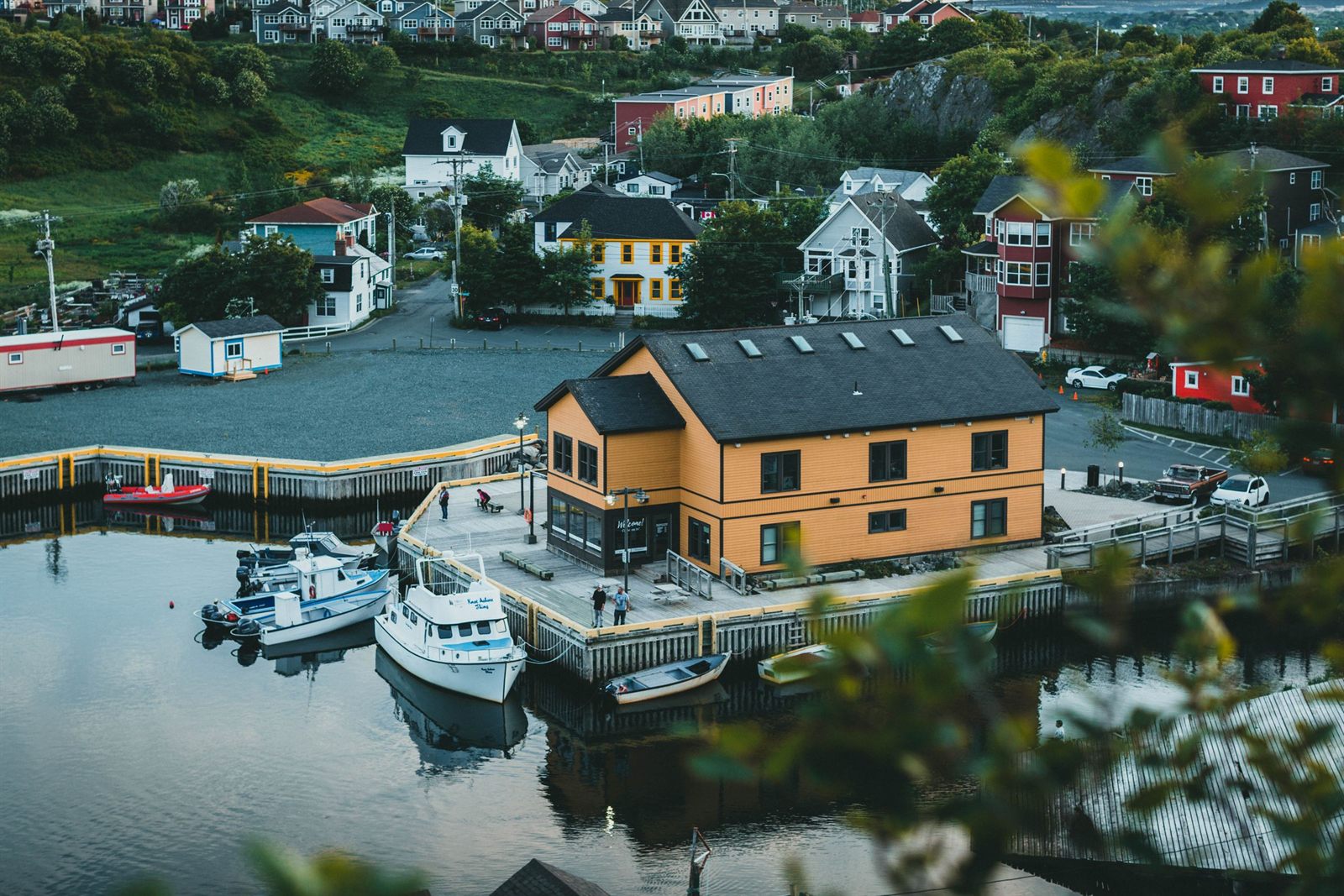 Harborfront houses and small boats in an Atlantic Canadian port town