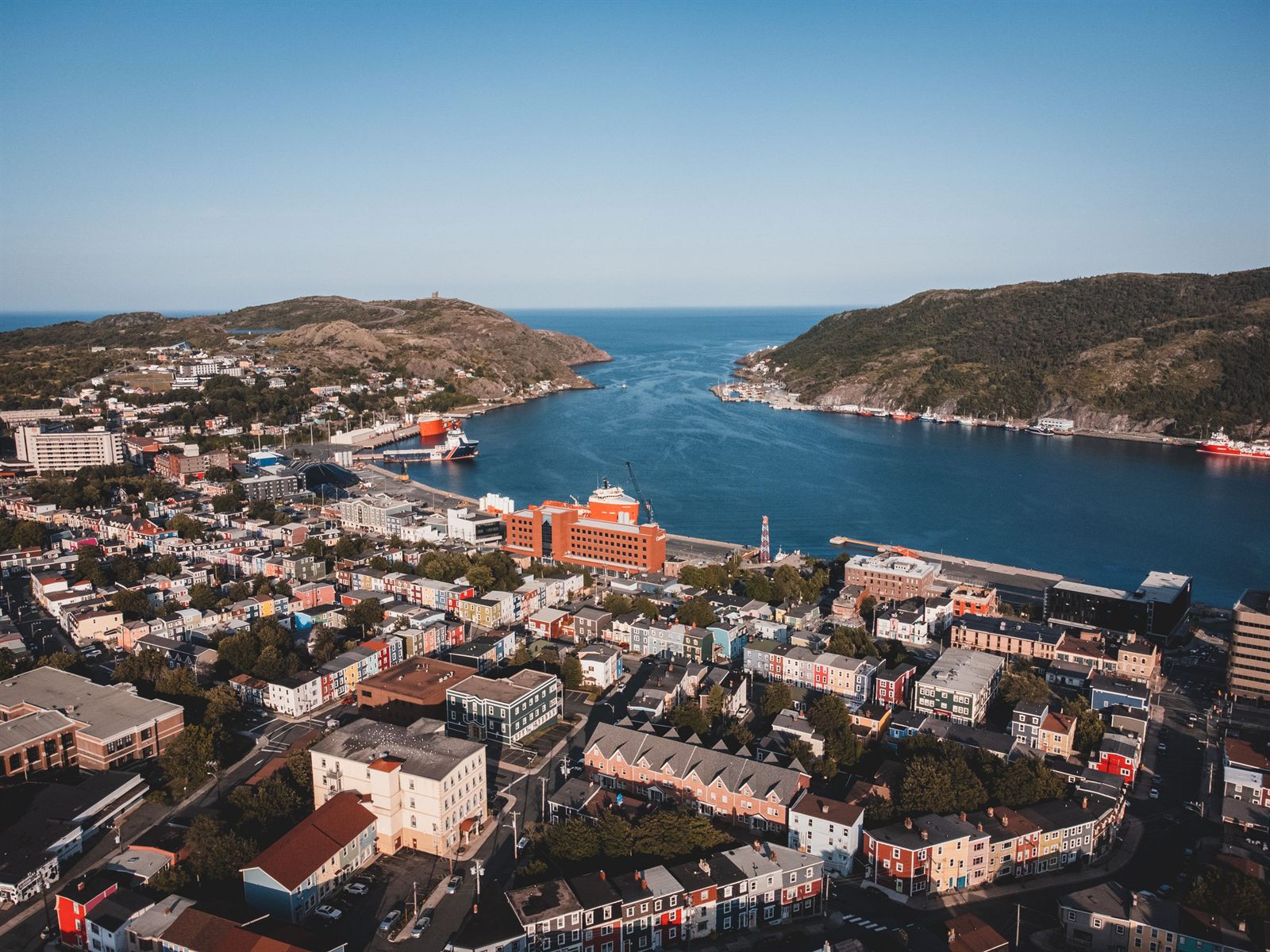 Harbor of St. John&rsquo;s, Newfoundland, opening to the Atlantic between green headlands