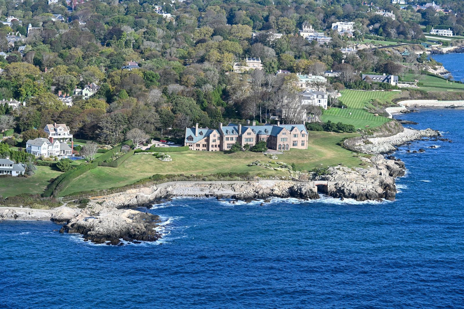 Aerial view of grand mansions on the rocky ocean shore of Newport, Rhode Island